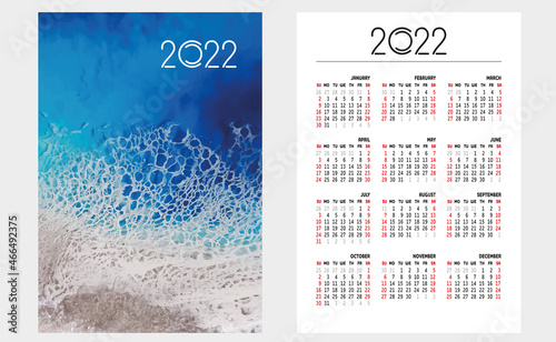 Layout of a pocket calendar with a grid for 2022. Sea background, waves and sea foam. English version of the grid. The week starts on Sunday