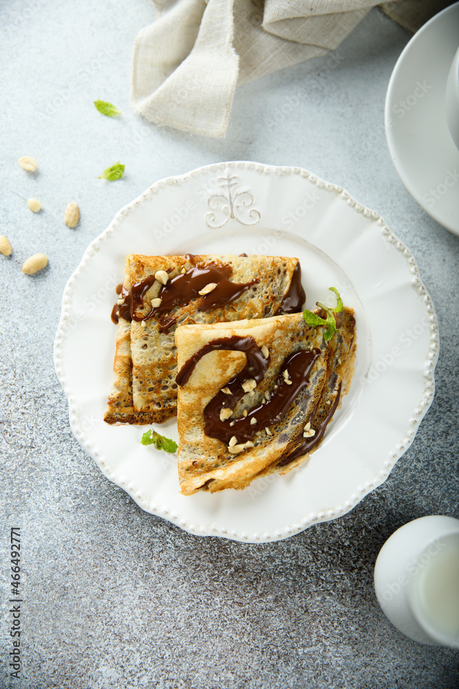 Homemade crepes with chocolate sauce Homemade crepes with chocolate sauce