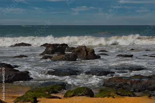 West Africa. Senegal. Rocky-sandy beach of the resort town of Ngaparou on the Atlantic Ocean. photo