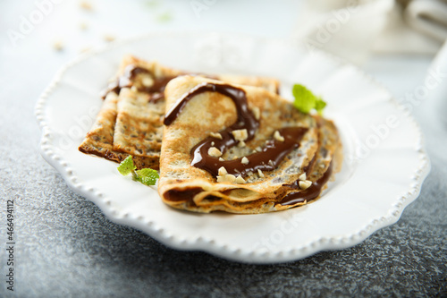 Homemade crepes with chocolate sauce