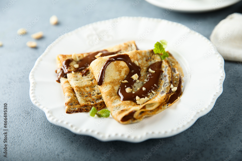 Homemade crepes with chocolate sauce Homemade crepes with chocolate sauce