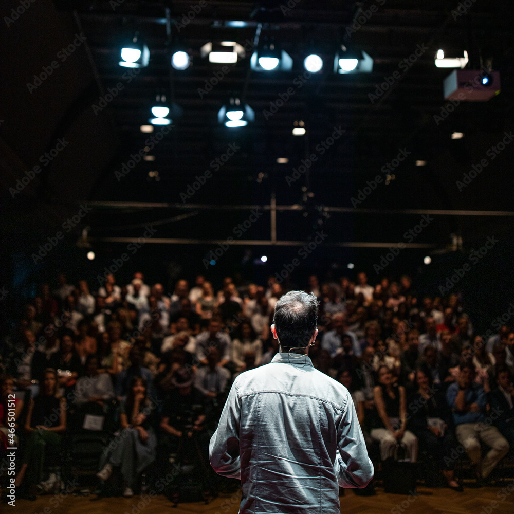 Speaker giving a talk on corporate Business Conference. Audience at the conference hall. Business and Entrepreneurship event. Speaker giving a talk on corporate Business Conference. Audience at the conference hall. Business and Entrepreneurship event.