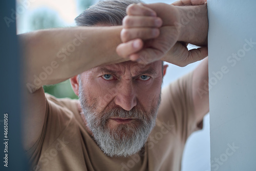Bilde på lerret Gloomy blue-eyed Caucasian man pondering over something