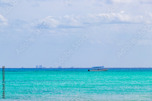 Boats yachts between Cozumel island and Playa del Carmen Mexico. © arkadijschell