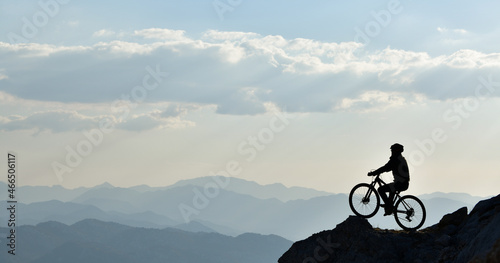 Young man cycling in nature