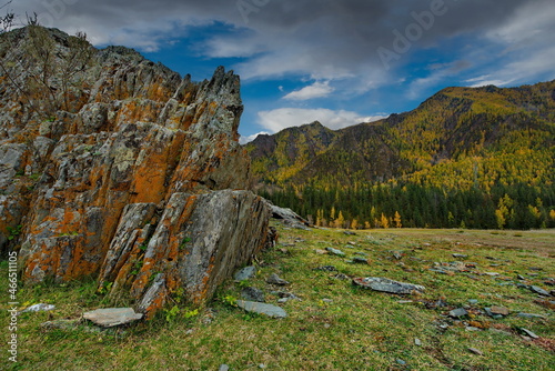 Russia. The South of Western Siberia, the Altai Mountains. Rocky mossy remains in the valley of the Chuya River near the village of Iodro along the Chuya tract. photo