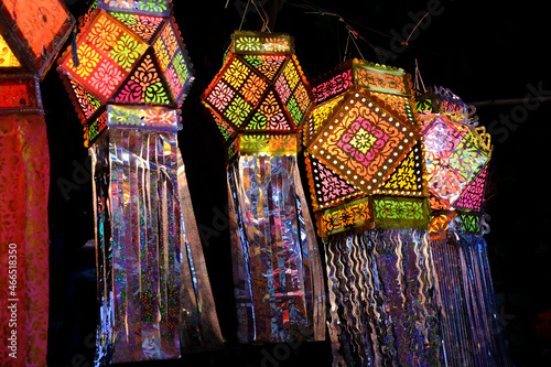 Pune, Maharashtra, India, Oct. 30, 2021 - Colorful traditional Lanterns in Various Shapes Akash kandil (Diwali decorative lamps) Hang out side shop for sale celebrating Diwali Festival. photo