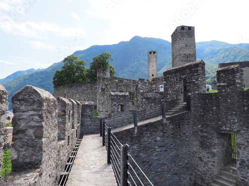 Stony flanking of castle in Bellinzona city in Switzerland photo