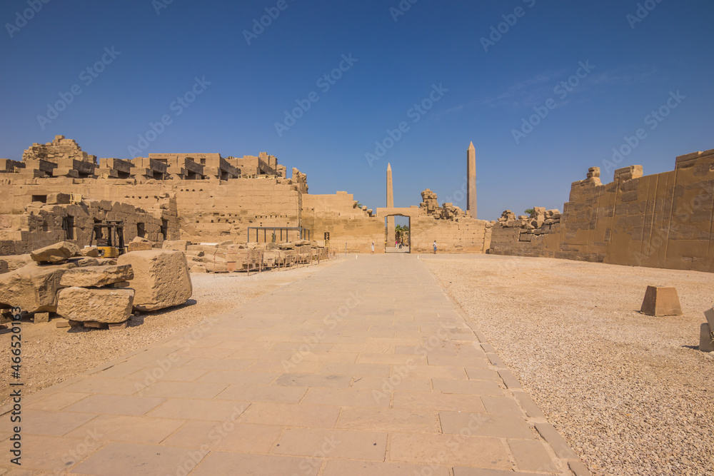 Fototapeta premium Anscient Temple of Karnak in Luxor - Ruined Thebes Egypt. Walls and Sphinxes at Karnak Temple. Temple of Amon-Ra