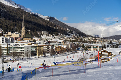 Sunny Winter Day in Davos. View from slope over Davos-platz photo