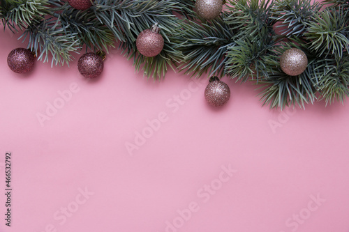 Christmas tree branch decorated with Christmas balls. New Year card  top view  flat lay.