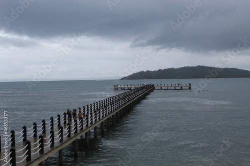 Long pier in the island sea Shore