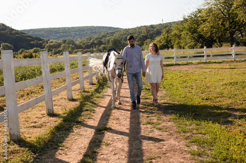 Couple walk at the ranch during summer day © oksix