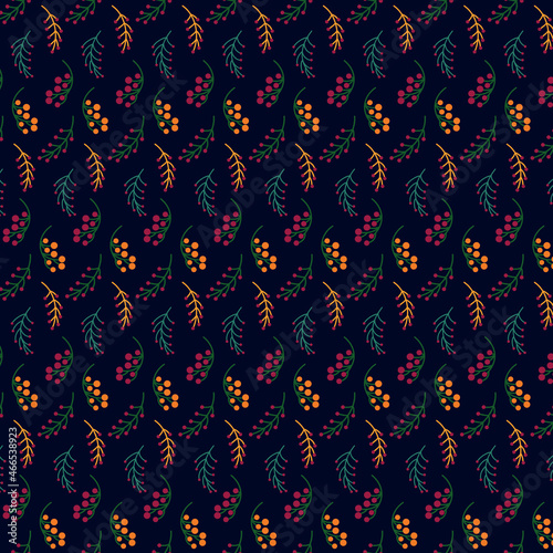 Seamless pattern of assorted withered leaves on blue background