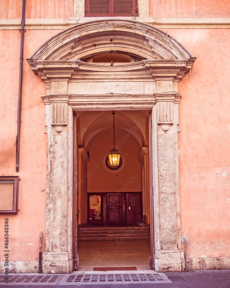 vintage building arched portico entrance, Rome Italy