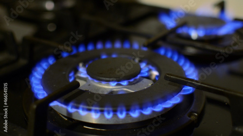 close up of stove  gas burners blue flame  the best for business