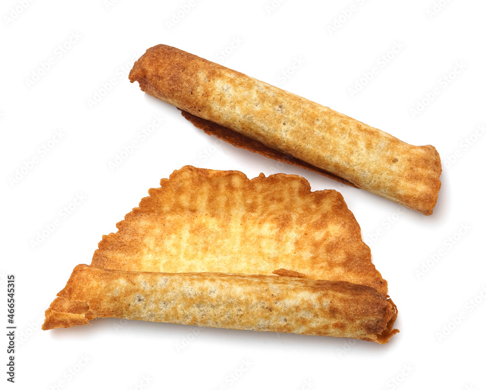 Homemade waffle cone with condensed milk isolated on a white background. Sweetness. Breakfast. Condensed milk. Dessert. Homemade waffle cone with condensed milk isolated on a white background. Sweetness. Breakfast. Condensed milk. Dessert.