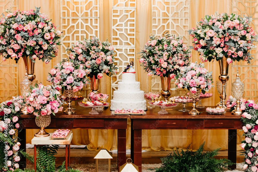wedding decoration - wedding table with cake, sweets and flowers wedding decoration - wedding table with cake, sweets and flowers