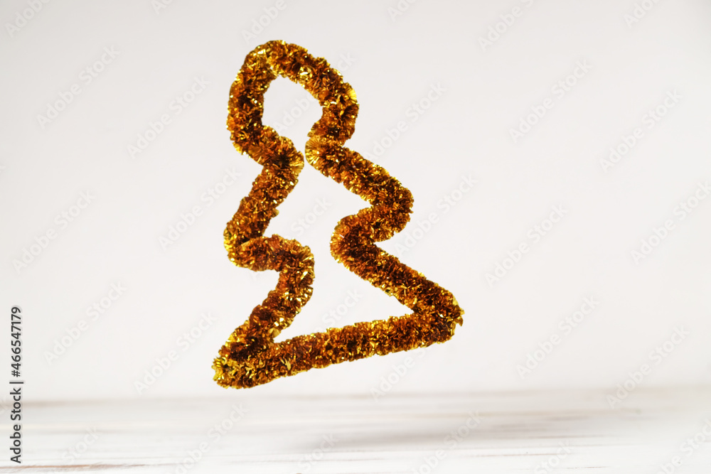 New Year's, Christmas tree levitates on a white background. New Year's, Christmas tree levitates on a white background.