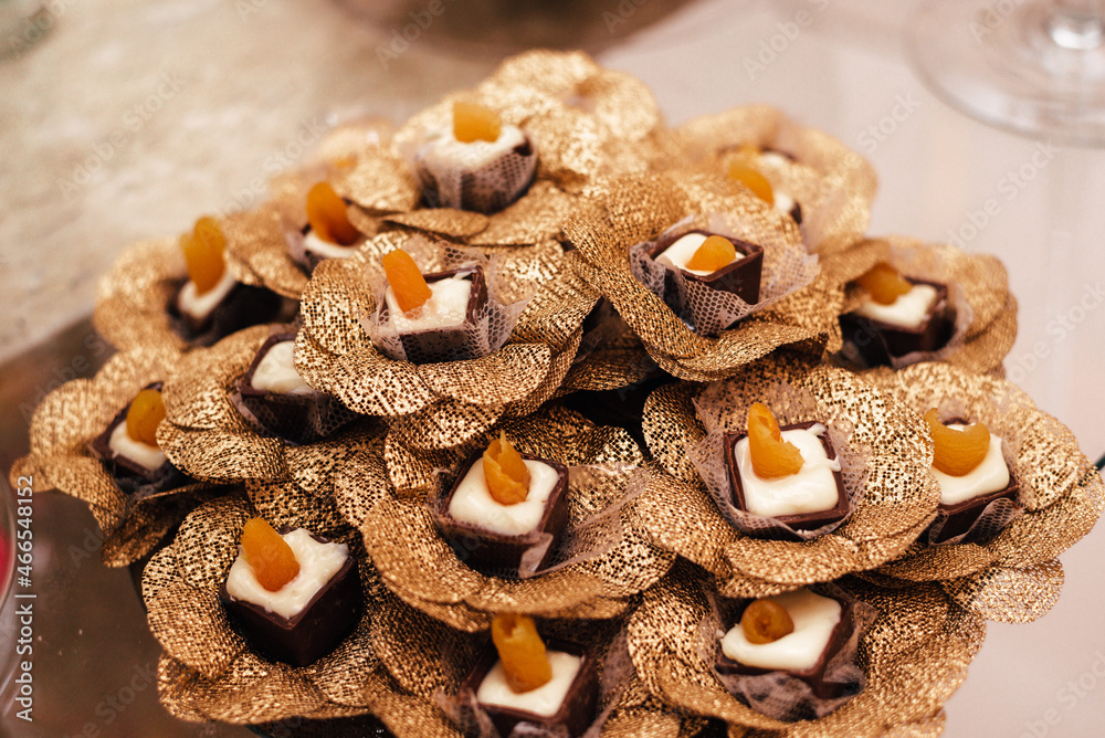 Fototapeta premium Wedding sweets - chocolate candy with apricot