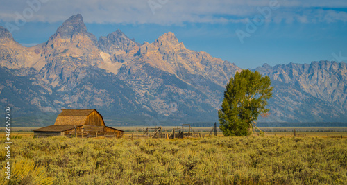 wooden barn on Mormon Row historic district  with the Teton Mountain Range in the background 
 photo