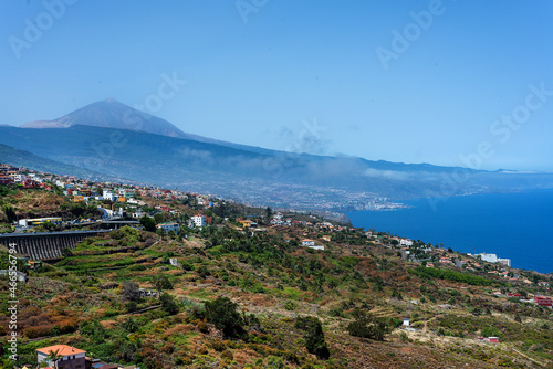 Panoramic view of La Orotava valley, with Puerto de la Cruz ciity i and the vulcano Teide in the top in a sunny day Canary Islands.