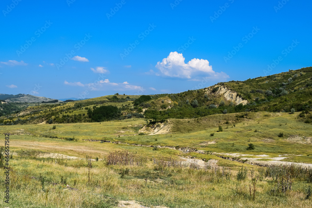 Transylvanian alps with green hills in Romania
Transylvanian alps with green hills in Romania