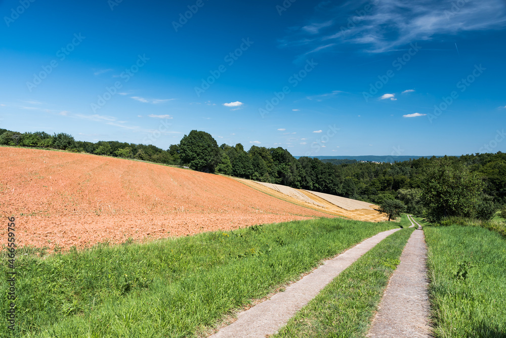 View over a road and agriculture fields on the German countryside