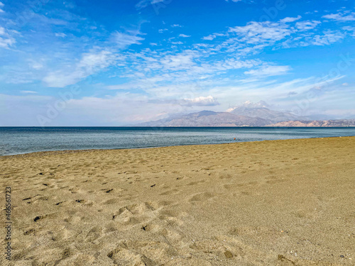 Sea like a mirror at the Komo beach in the south of Crete in Greece. With its golden sand stretches for more than four kilometres on the western edge of the fertile Messara plain