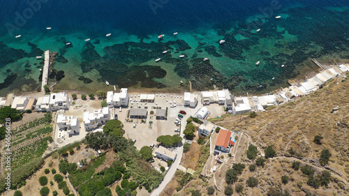 Aerial drone photo of picturesque seaside village of Klima and traditional fishermen settlement with colourful boat garages called syrmata in island of Milos, Cyclades, Greece photo