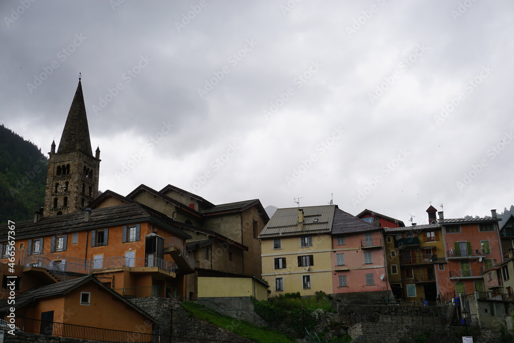 view of colorful buildings in small alpine village, france view of colorful buildings in small alpine village, france