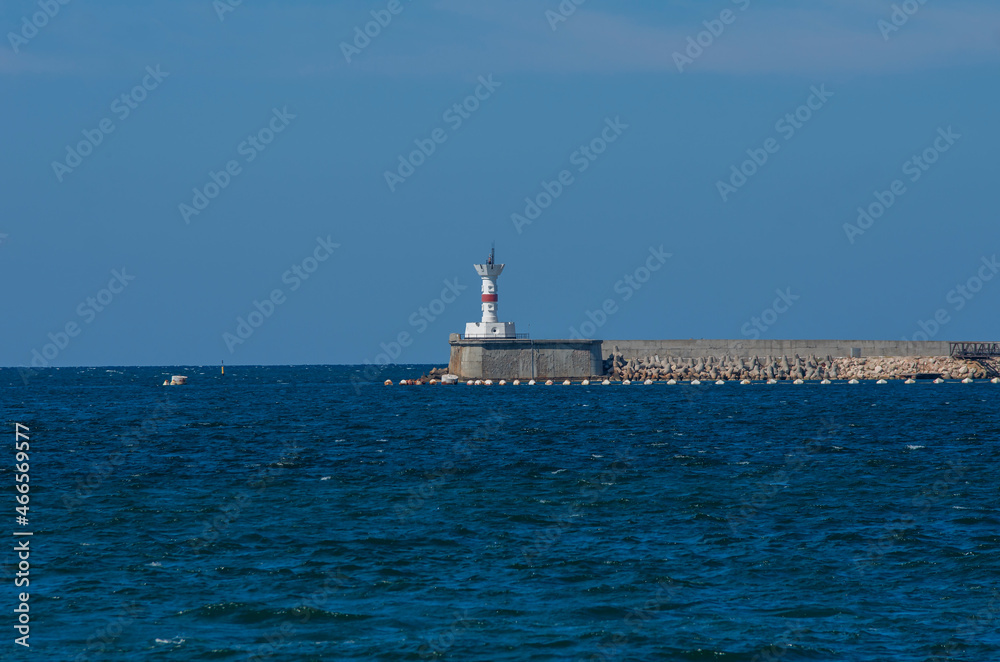 Lighthouse at the entrance to the Sevastopol Bay in the afternoon. Lighthouse at the entrance to the Sevastopol Bay in the afternoon.