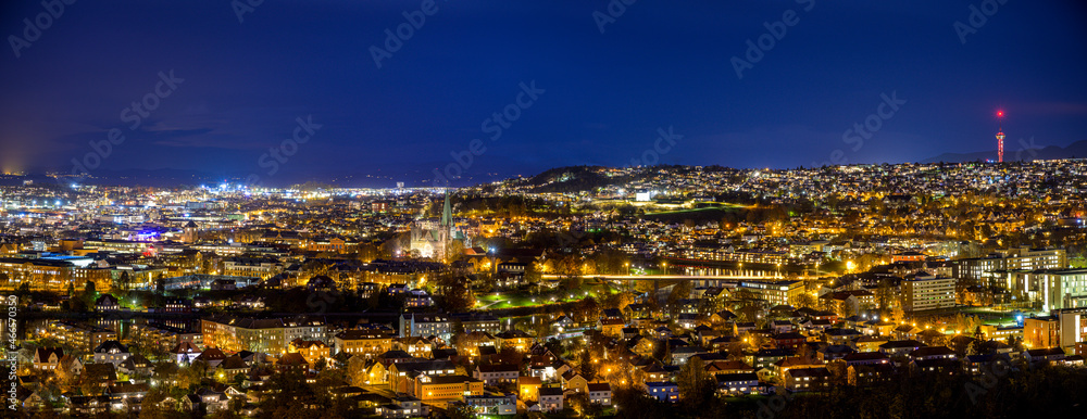 Panorama picture of Trondheim by night with Nidarosdomen and Tyholt tower in the frame