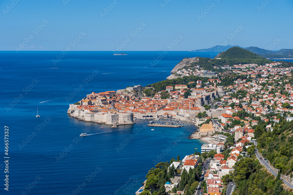 Aerial view of the old town Dubrovnik, blue sea and mountains, Croatia