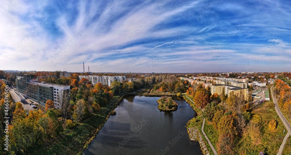 Autumn panorama of the city of Lodz .Autumn  city park. City ponds and water reservoirs Top view, photo from the drone 