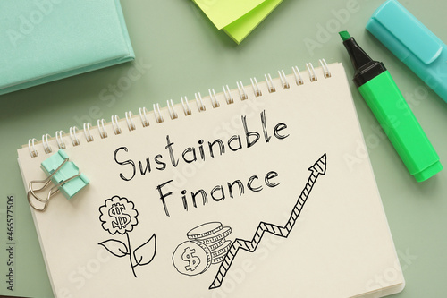 Sustainable finance is shown on the business photo using the text