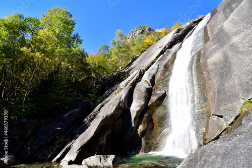 Falls erode the granitic mountain in Val di Mello. The falls are called Cascate del Ferro and their action has dig chanel and natural slide in the granitic stone.