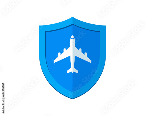 Airplane on blue shield. Travel insurance concept. Safe flight by plane badge concept. Jet trip protection symbol. Safety aircraft journey vector isolated sign