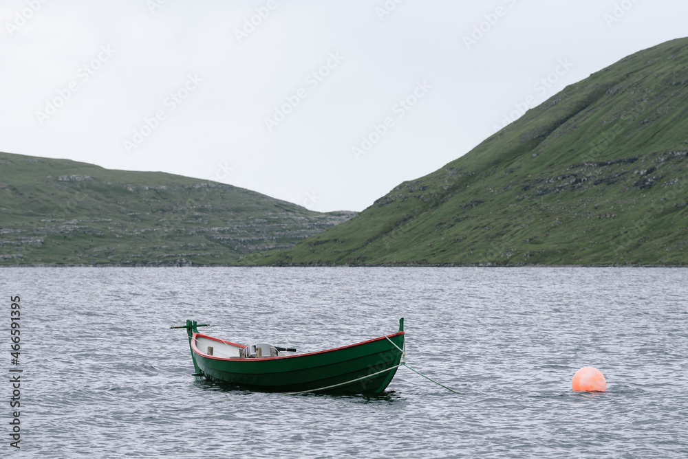 Boat on Lake Sorvagsvatn or Leitisvatn on Vagar Island, Faroe Islands