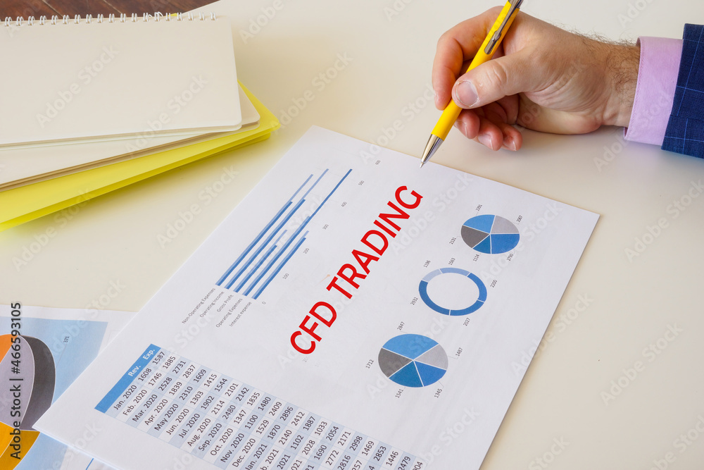 Business concept meaning CFD TRADING with phrase on the piece of paper. Business concept meaning CFD TRADING with phrase on the piece of paper.