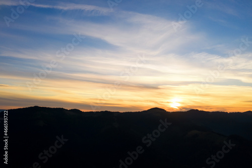 Silhouette of mountain landscape at sunset. Drone photography