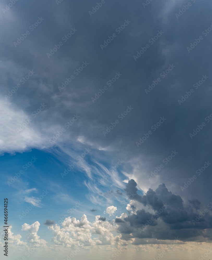 Fantastic thunderclouds, vertical panorama