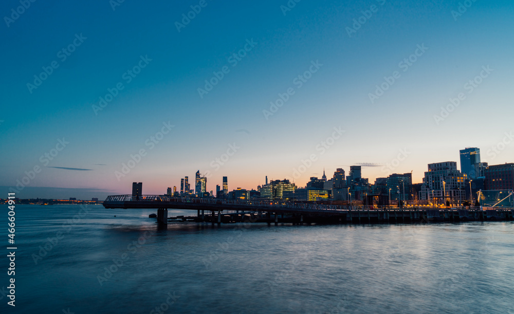 city skyline at sunrise bridge pier New York  sky  