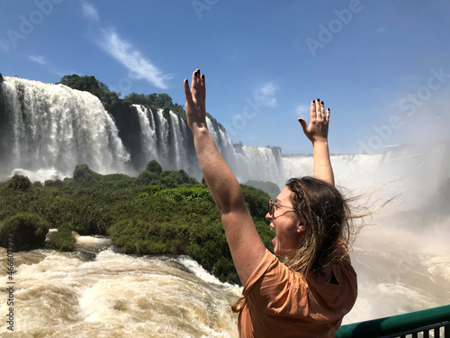 Brazilian woman tourist in the Iguassu Falls photo