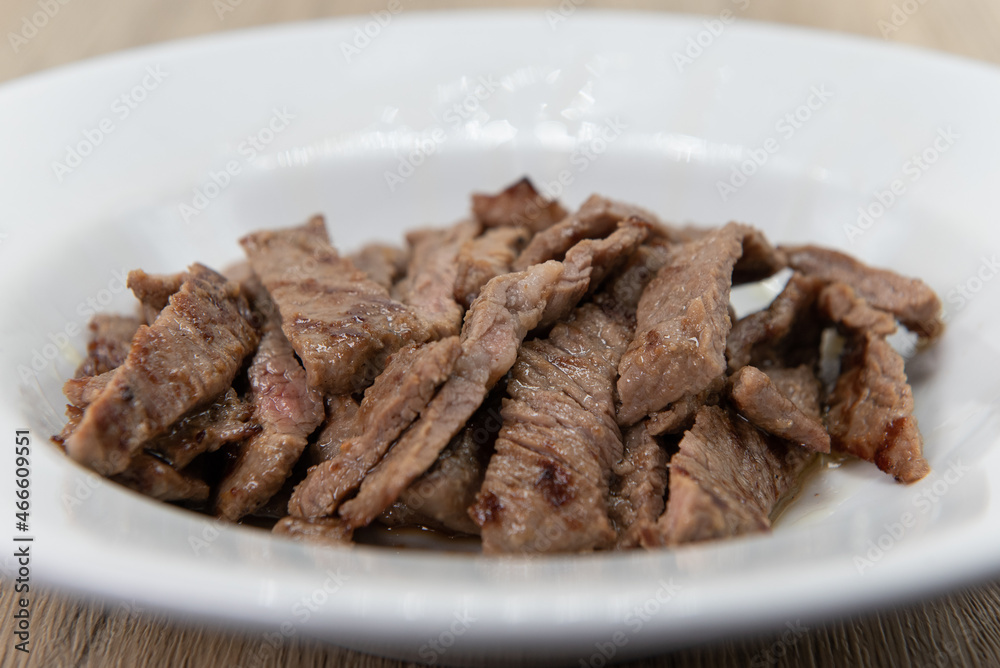 Grilled and sliced Tikka steak served up in a bowl a la carte for some extra protein Grilled and sliced Tikka steak served up in a bowl a la carte for some extra protein