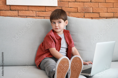 Little boy watching cartoon...