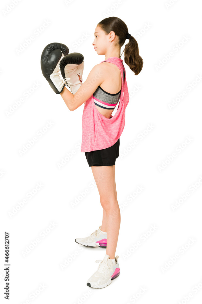 Full length of an athletic girl on boxing lessons Full length of an athletic girl on boxing lessons