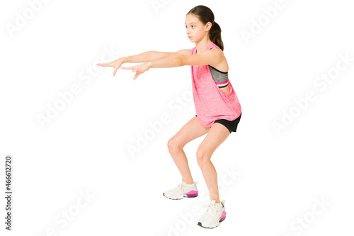 Sporty girl in sportswear exercising