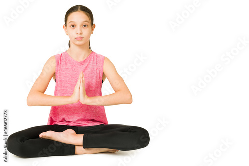 Portrait of a fit girl meditating