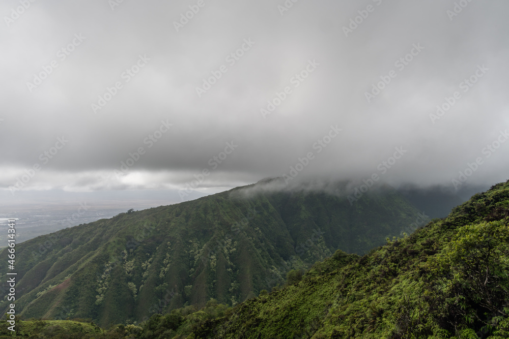 Scenic view along the Waihee Ridge Trail on a heavily overcast day, Maui, Hawaii 
